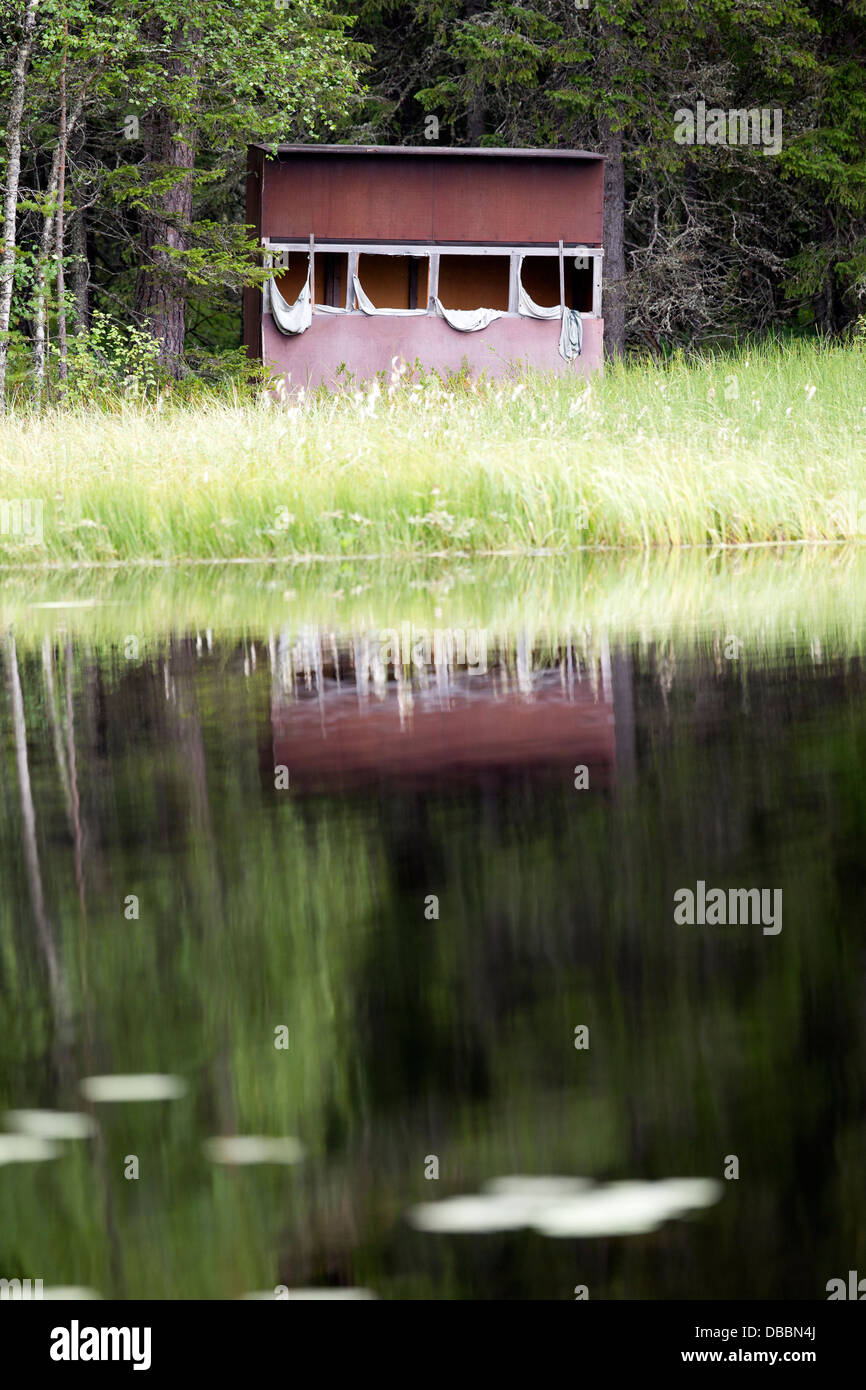 Wildlife watching hide on a freshwater Lake, Lentiira, Kuhmo, Finland Stock Photo