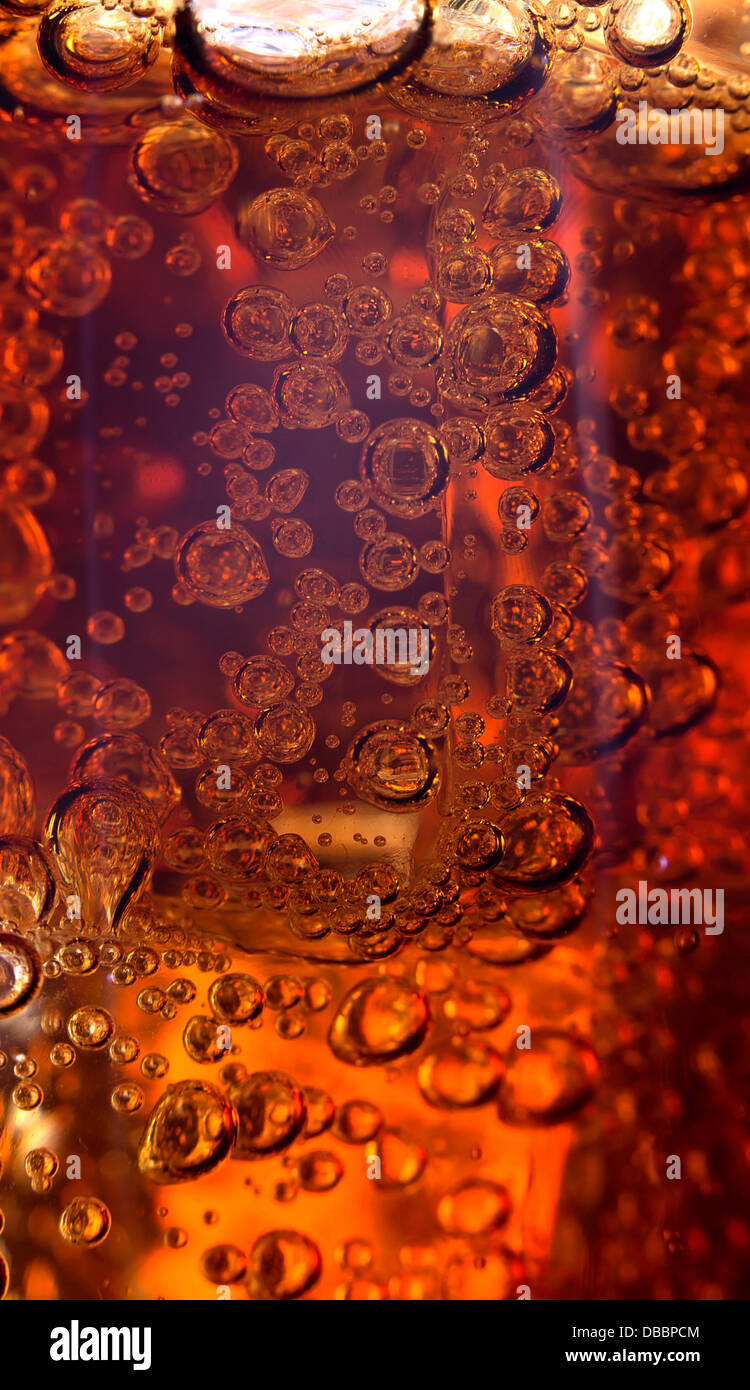 Close up view of the ice cubes in cola background Stock Photo - Alamy