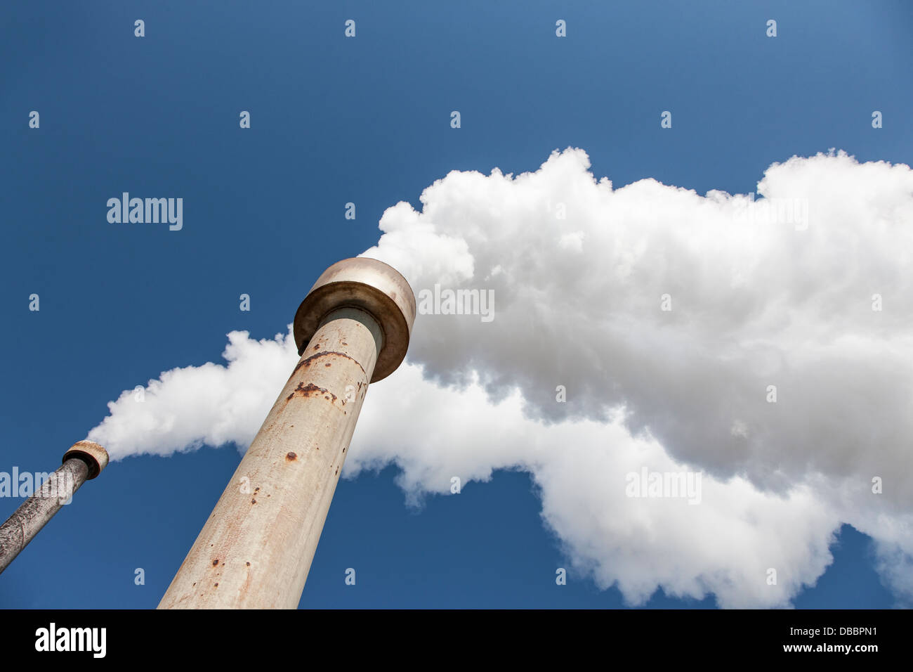 Massive amount of smoke coming from a factory Stock Photo