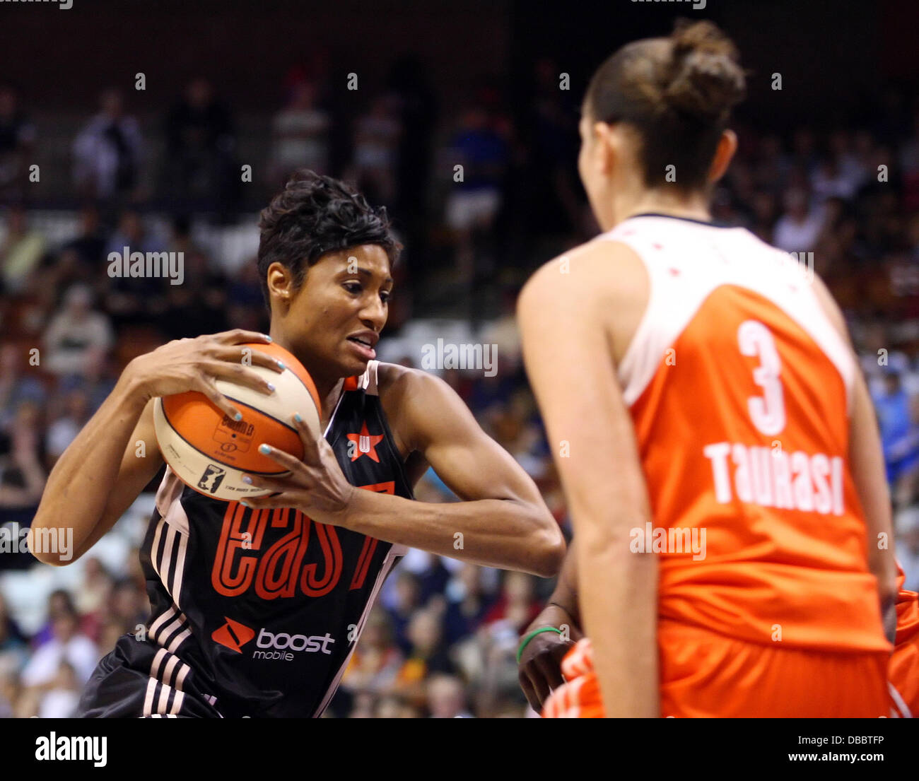 Uncasville, Connecticut, USA. 27th July, 2013. Eastern Conference guard-forward Angel McCoughtry (35) of the Atlanta Dream is defended Western Conference guard Diana Taurasi (3) of the Phoenix Mercury during the 2013 WNBA All-Star game at Mohegan Sun Arena. The Western Conference defeated the East 102-98. Anthony Nesmith/CSM/Alamy Live News Stock Photo