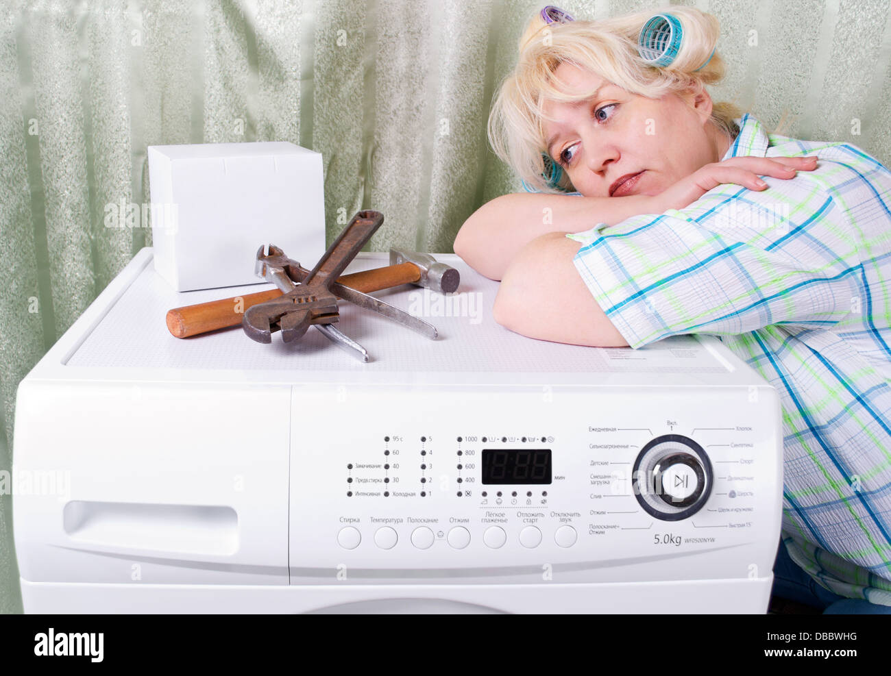 Broken washing machine Stock Photo Alamy