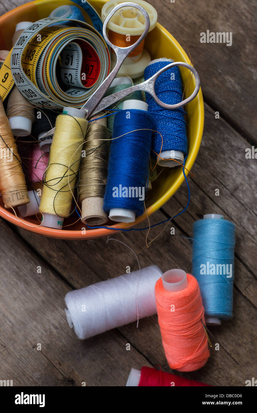 Instruments of repairman clothing and thread Stock Photo Alamy