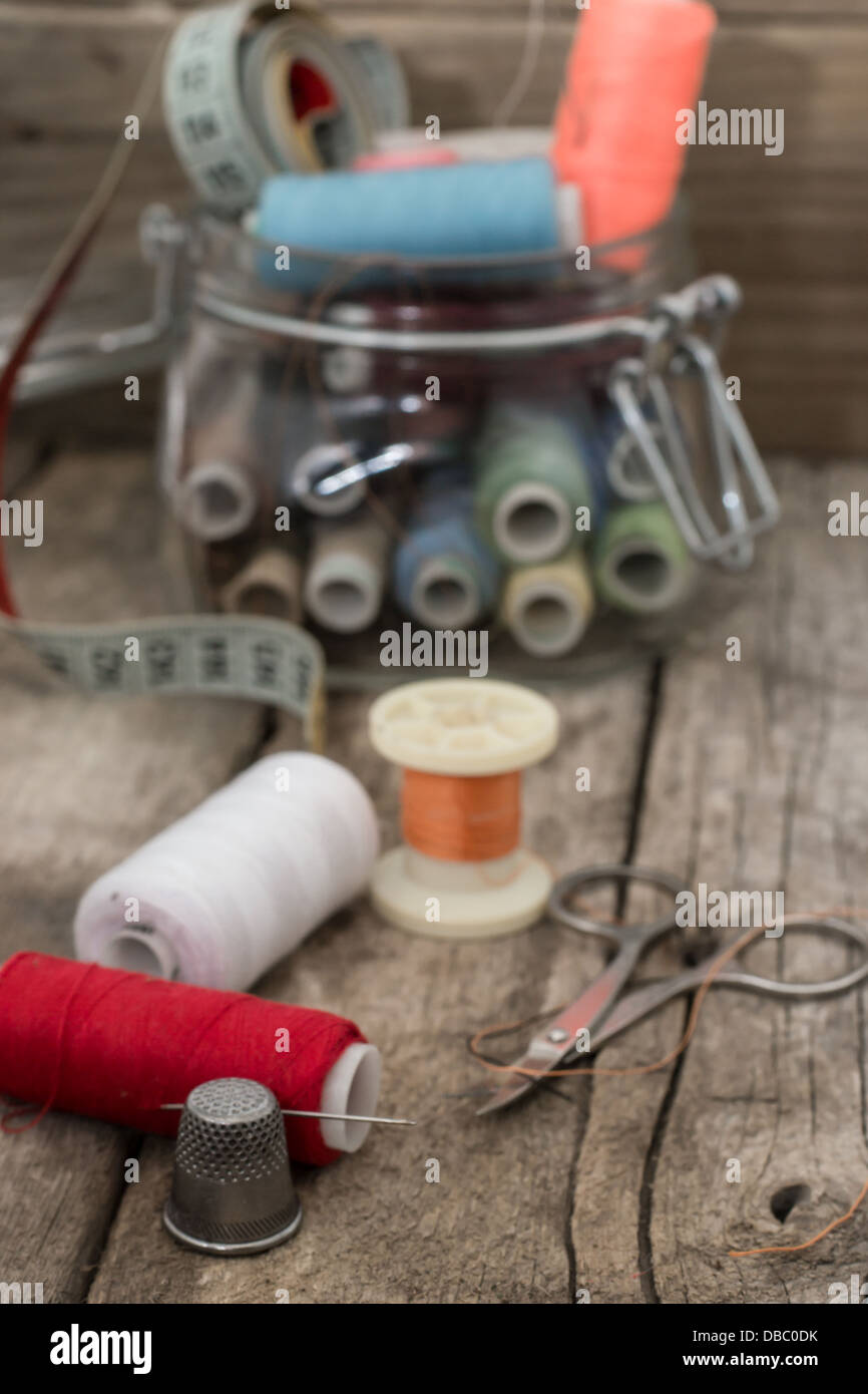 Instruments of repairman clothing and thread Stock Photo Alamy