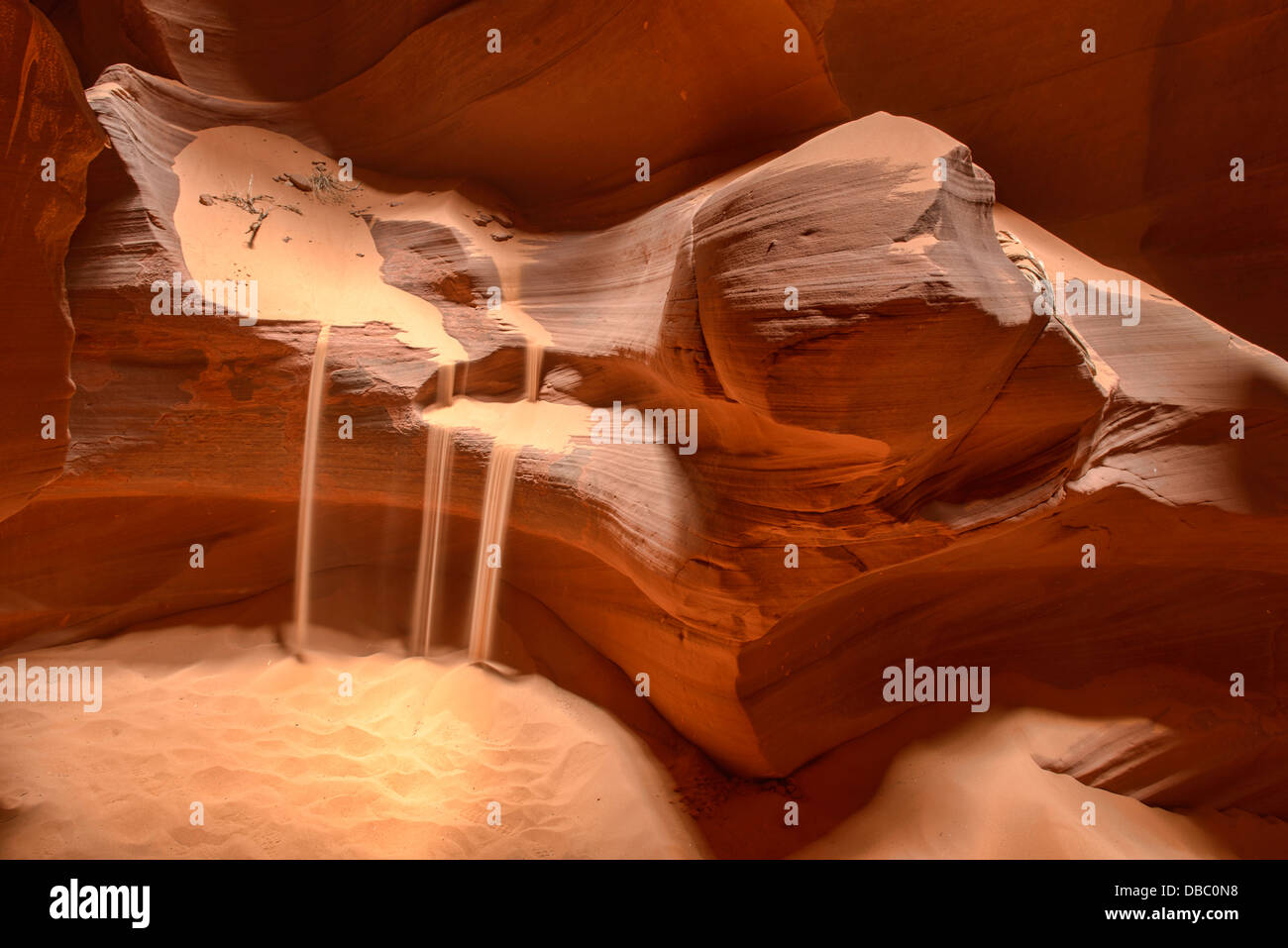 sand pouring in Upper Antelope Canyon, Page, Arizona. Stock Photo