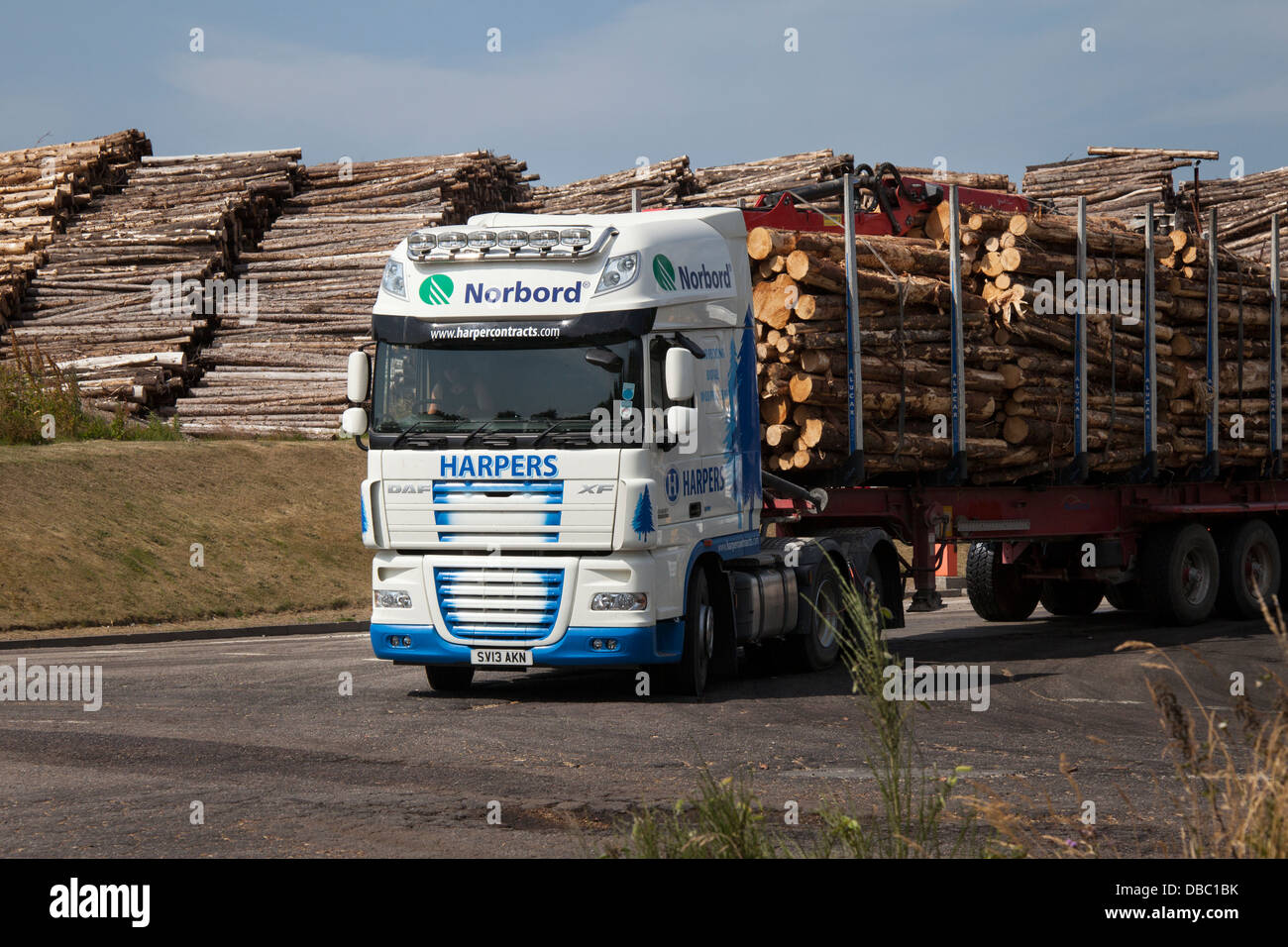 Harpers Scottish Tree Logging Trucks; Emissions from Bioenergy Norbord processing plant Inverness - Morayhill, Dalcross, Invernessshire, Scotland, UK Stock Photo