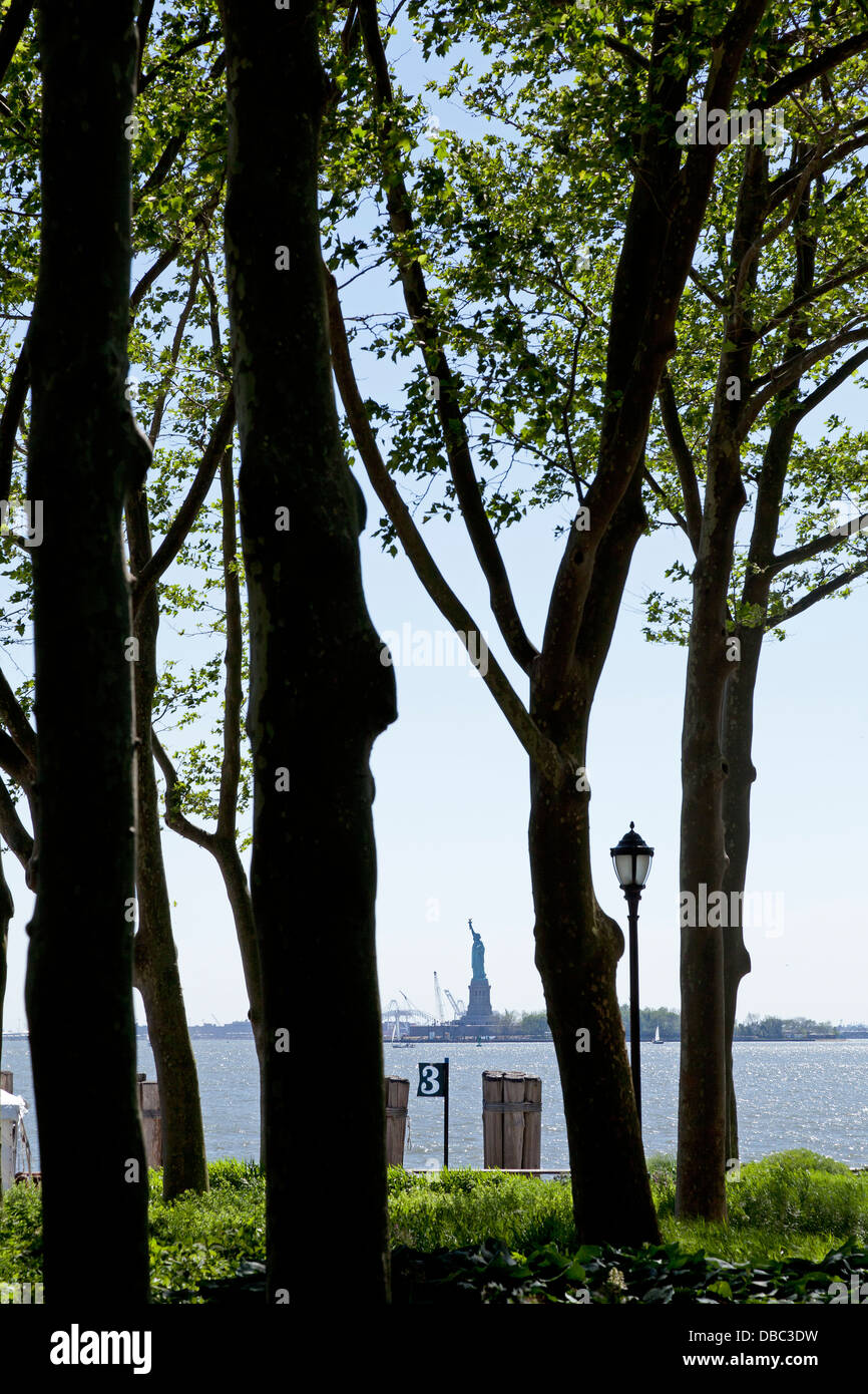 Statue of Liberty seen from Battery Park, New York City Stock Photo