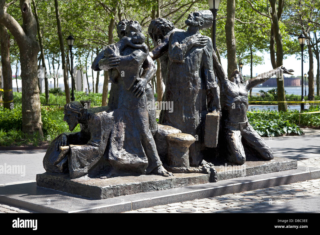 The Immigrants Monument in Battery Park, New York City Stock Photo