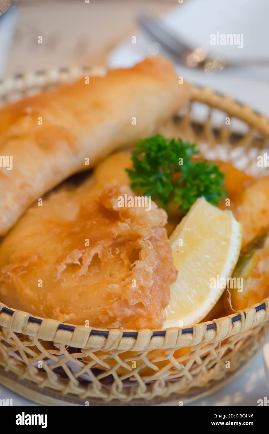 deep fried fish and chips in basket and slice lemon Stock Photo Alamy