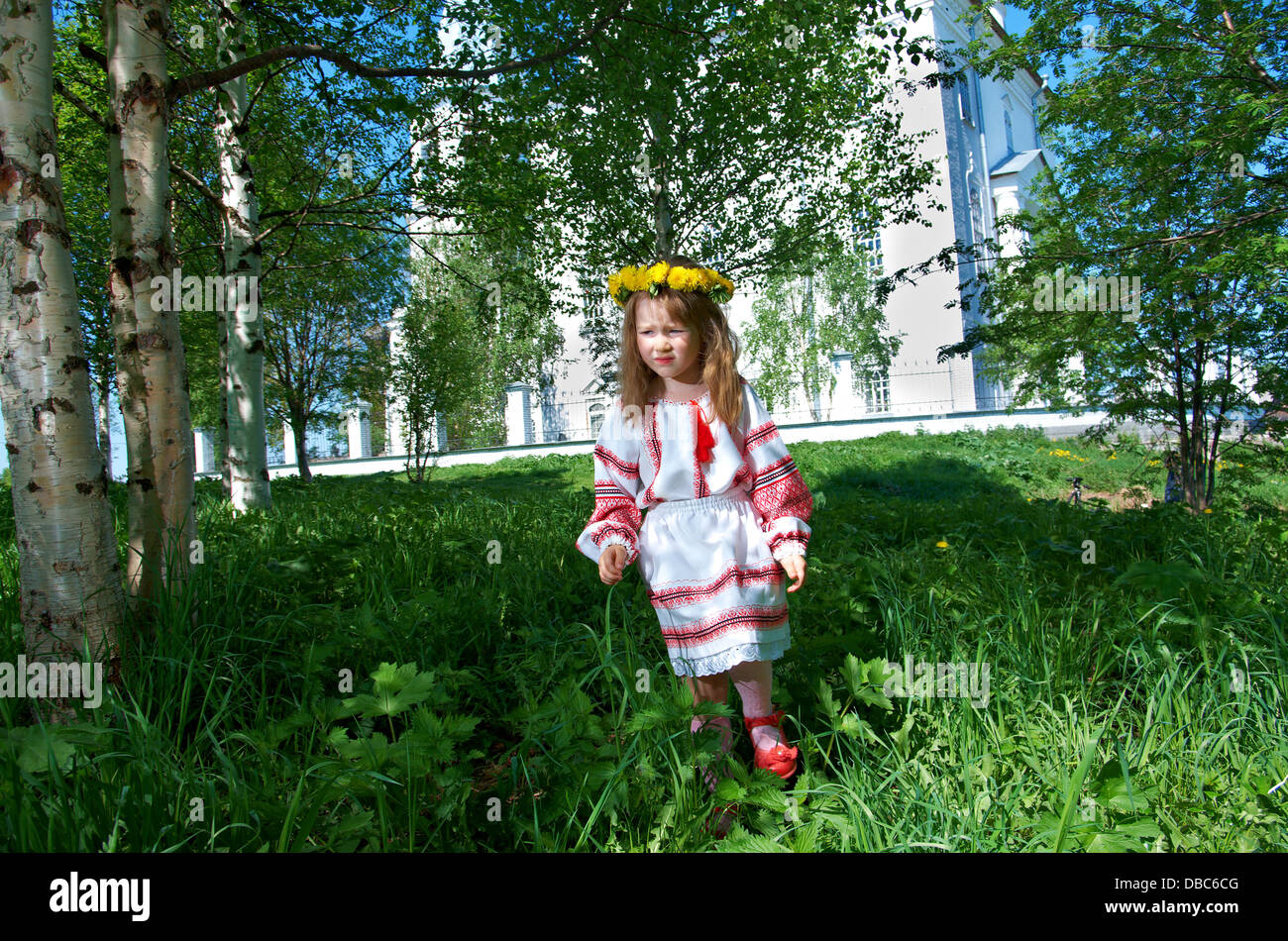 Russian little girl on a orthodox church background. Stock Photo