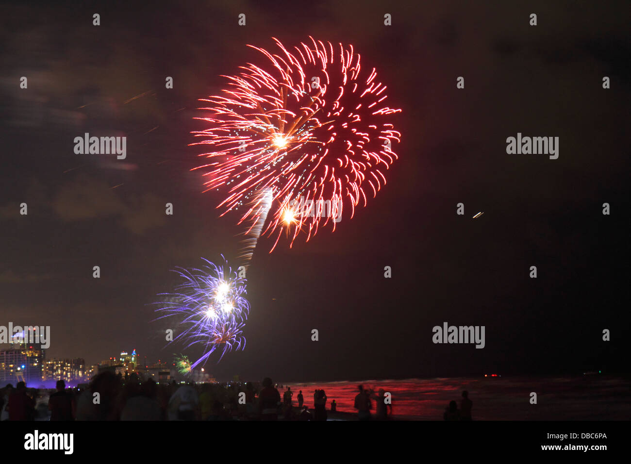 Miami Beach Florida,Fourth 4th of July,fireworks product products display sale,celebration,public event,burst,night,Atlantic Ocean water,shoreline,cro Stock Photo