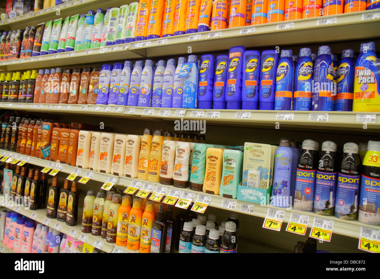 Fort Ft. Lauderdale Florida,Winn grocery store supermarket,food,sun screen,sunscreen,sunblock,suntan lotion,competing brands,sale,retail product produ Stock Photo