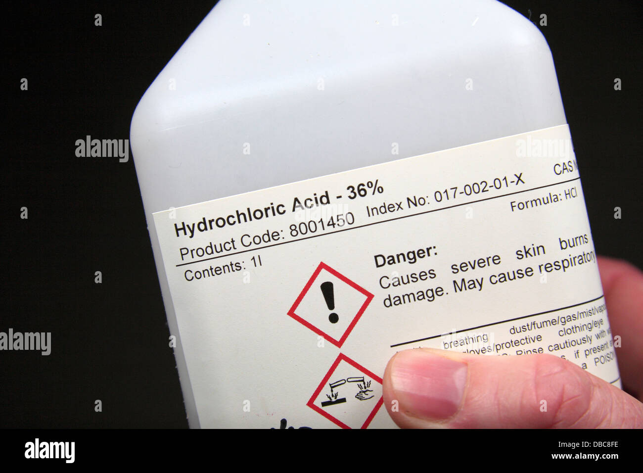 A bottle of Hydrochloric acid (36% - molarity 11.64, laboratory grade) as used in a UK high school. Stock Photo