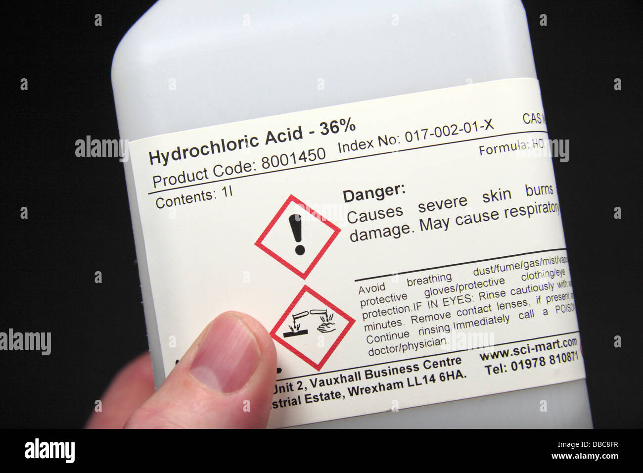 A bottle of Hydrochloric acid (36% - molarity 11.64, laboratory grade) as used in a UK high school. Stock Photo