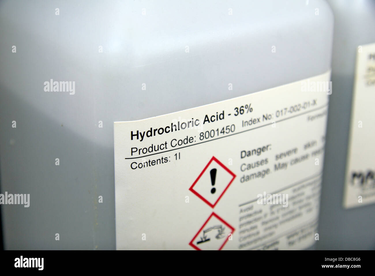 A bottle of Hydrochloric acid (36% - molarity 11.64, laboratory grade) as used in a UK high school. Stock Photo