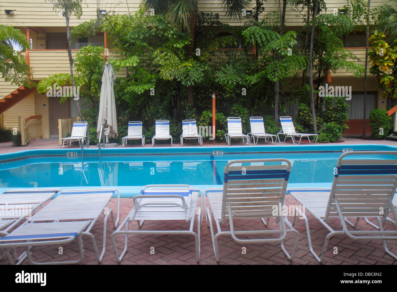 Fort Ft. Lauderdale Florida,Days Inn Bahia Cabana,motel,hotel,budget,swimming pool area,lounge chairs,looking FL130720134 Stock Photo