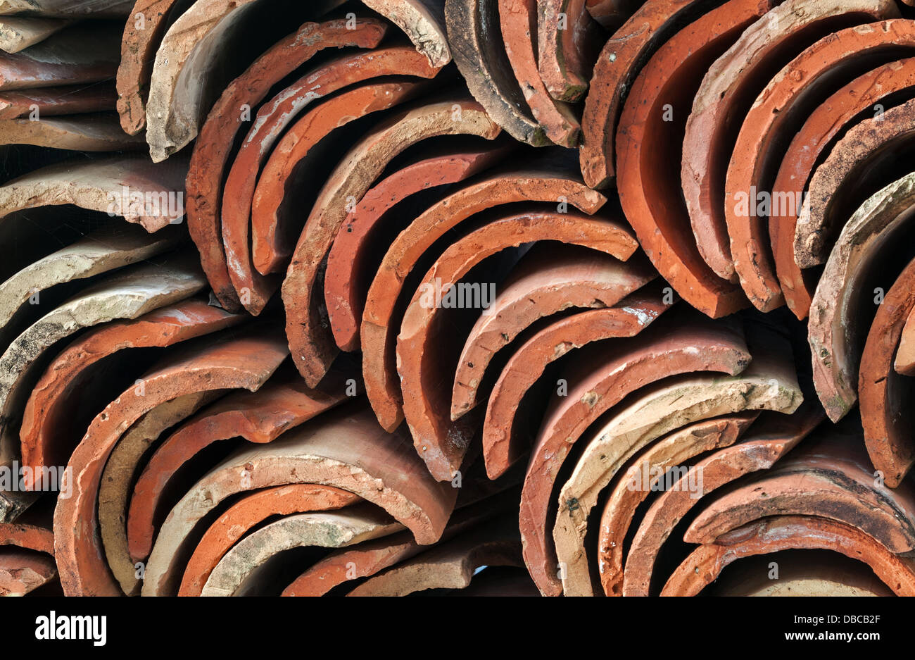 Stack of old red roof tiles Stock Photo
