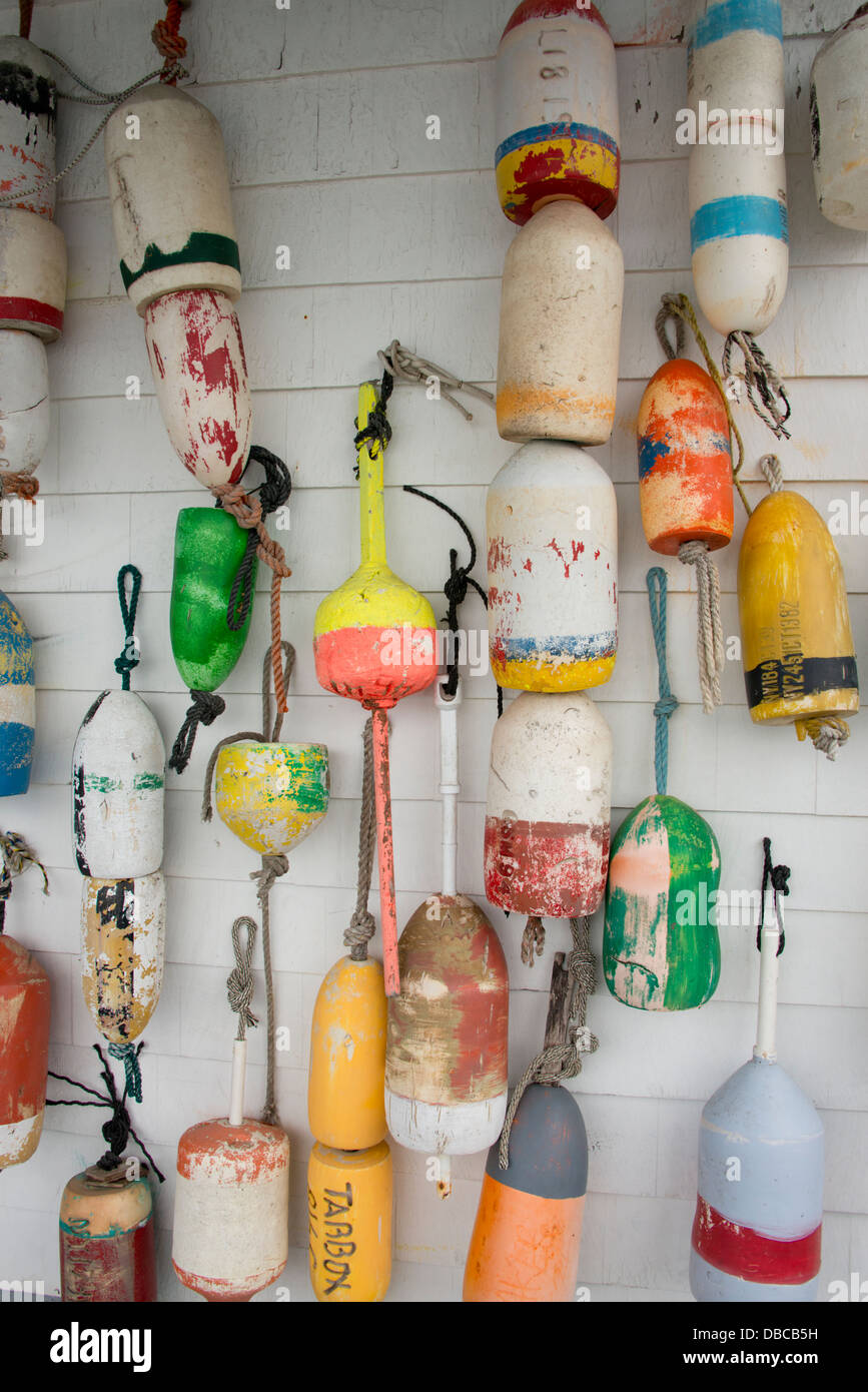 Fishing buoys hanging on wall hi-res stock photography and images