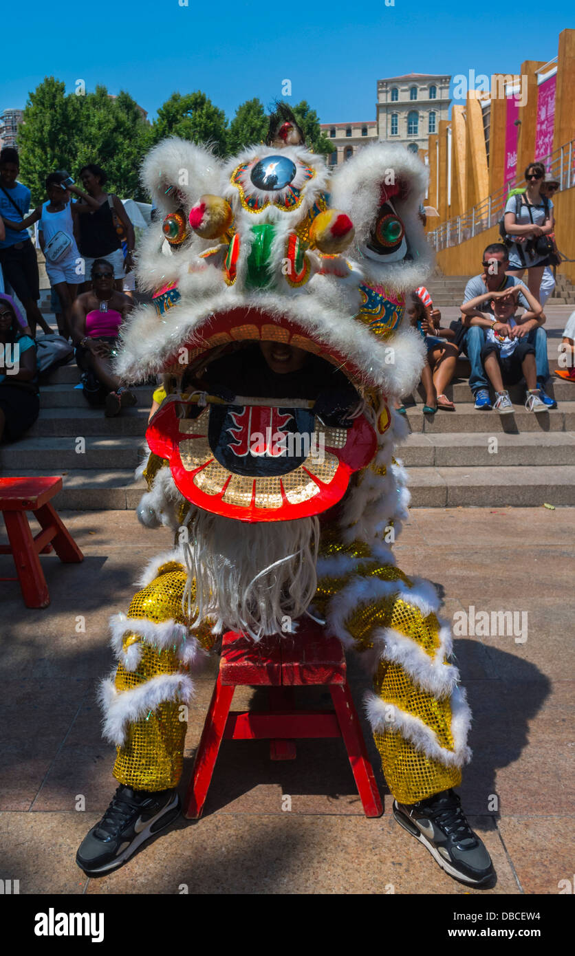 Marseille, France, Close up, Front, Head, Man Performing Traditional Chinese Dragon Dance on Street, South of France, Street Carnival, Parade, Stock Photo