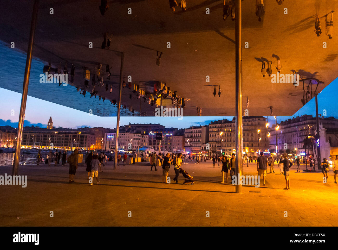 Marseille France, Tourists Visiting Vieux Port area, Street Scenes, With Huge Mirror Installation at Dusk Stock Photo
