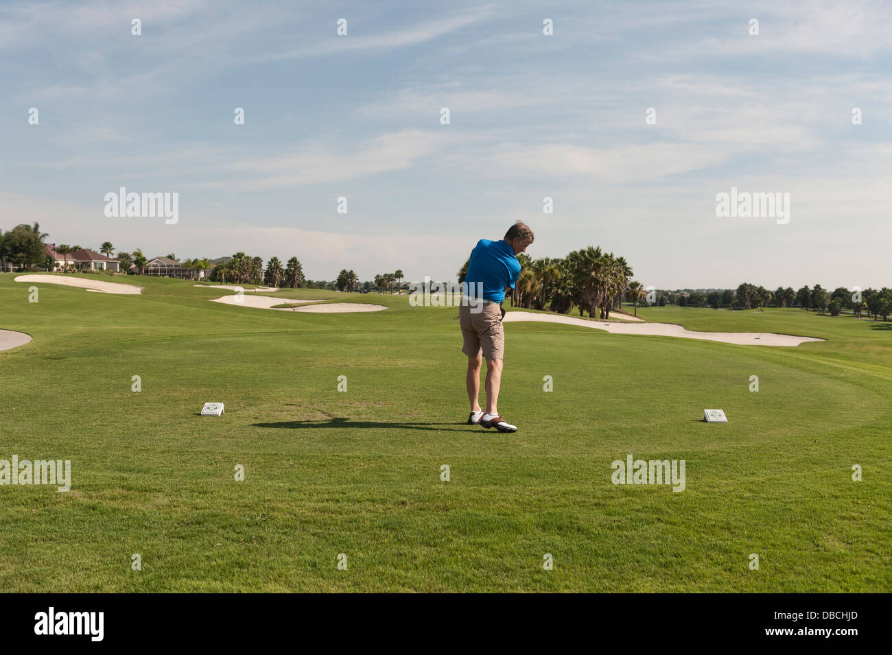 A man golfing on the Amelia course at the Mallory Hill Country Club in The Villages, Florida. An  adult retirement community. Stock Photo