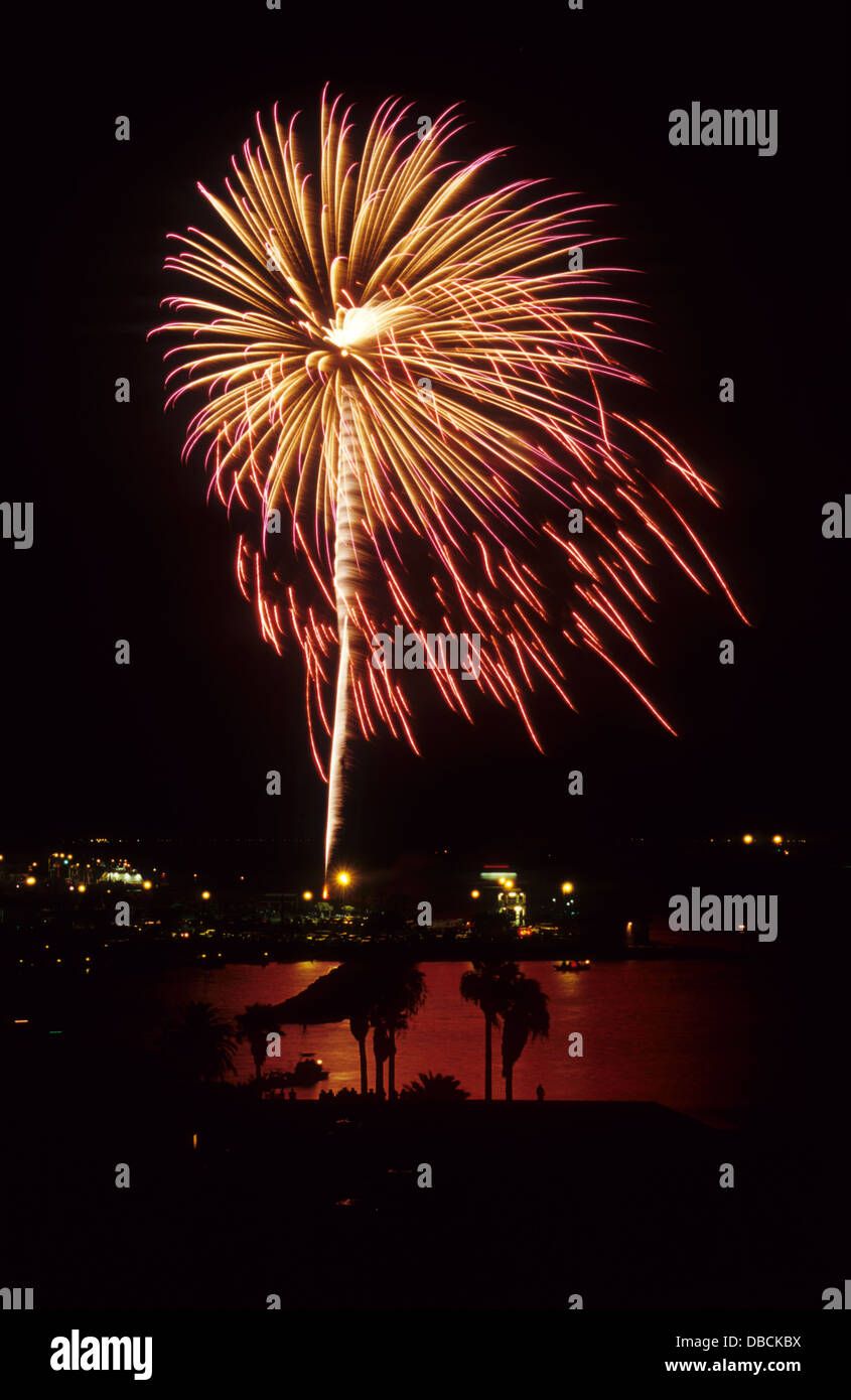 July Fourth fireworks over the harbor at Port Aransas Texas Stock Photo