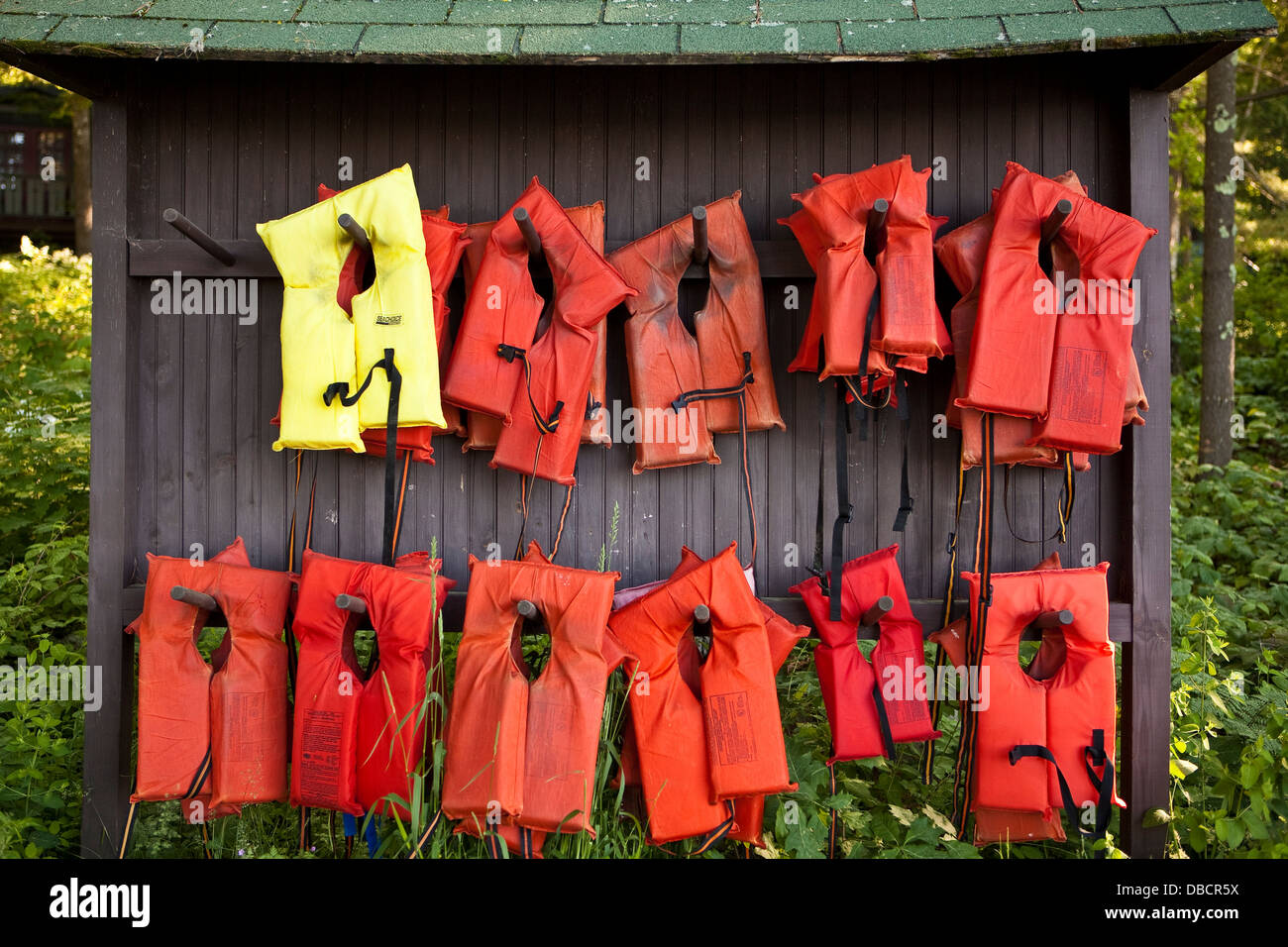 Life Vests are pictured at Migis Lodge by Sebago Lake in South Casco, Maine Stock Photo