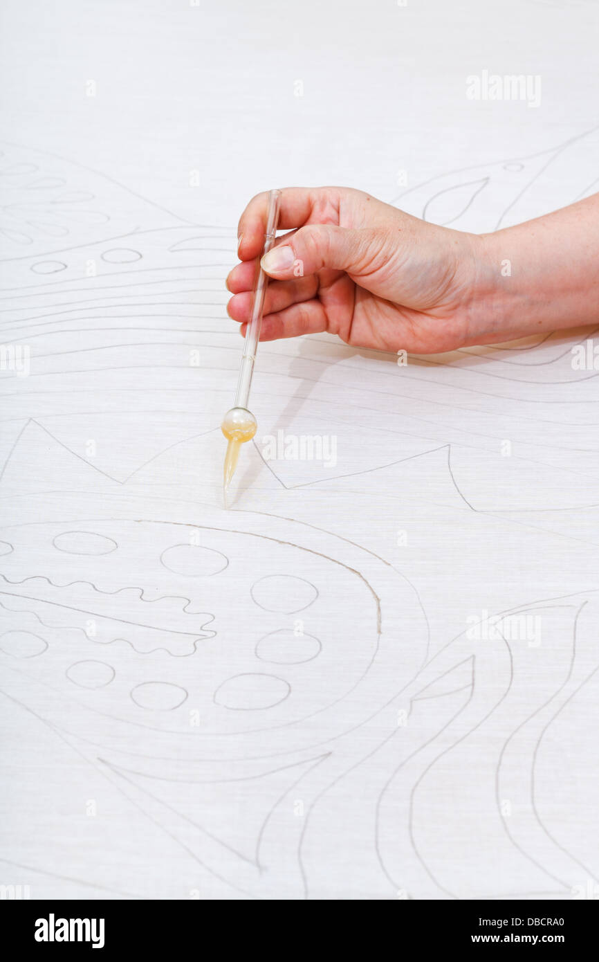 reserve contour drawing on silk for cold batik painting Stock Photo
