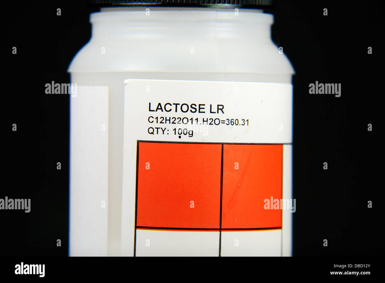 A container jar of lactose as used in a UK high school. Stock Photo