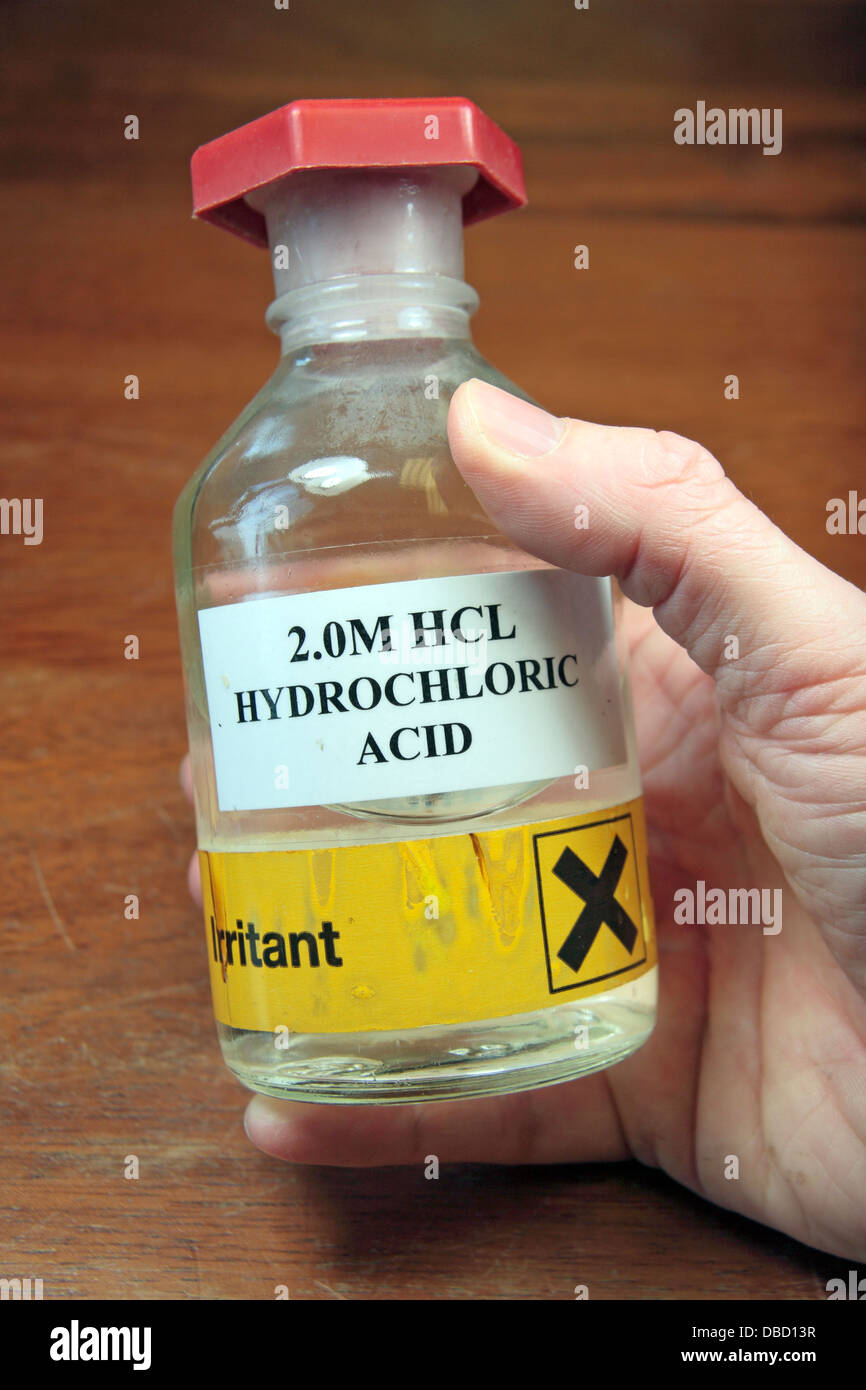 A bottle of 2.0M Hydrochloric acid (HCL) as used in a UK high school. Stock Photo