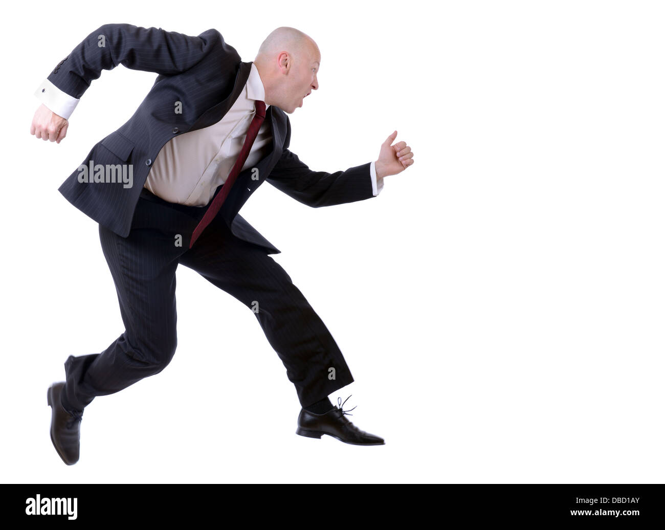 businessman running isolated on white background with slight motion blurr Stock Photo