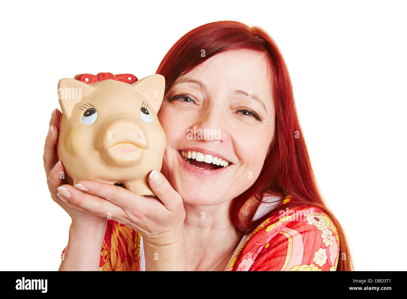 Elderly happy woman with piggy bank near her face Stock Photo - Alamy