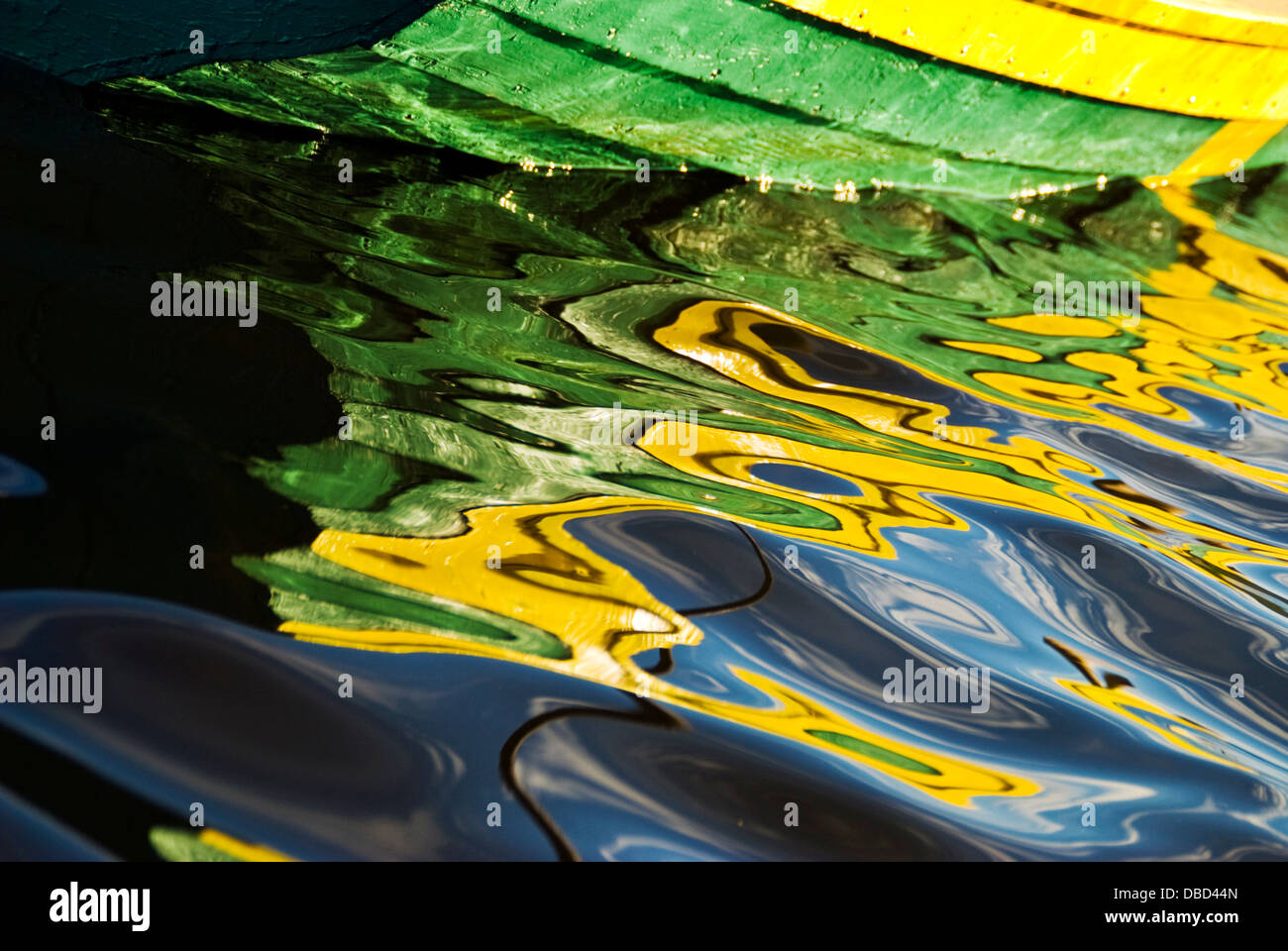 Abstract patterns in water from wooden boat reflections Stock Photo - Alamy
