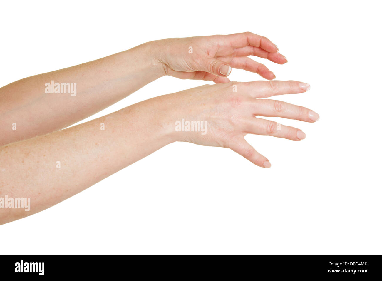 Two female hands reaching out to the right Stock Photo