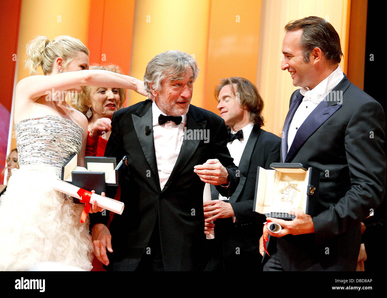 Best Actress Kirsten Dunst, jury member Robert De Niro and Best Actor Jean  Dujardin 2011 Cannes International Film Festival - Closing Ceremony and  Awards - Inside Cannes, France - 22.05.11 Stock Photo - Alamy