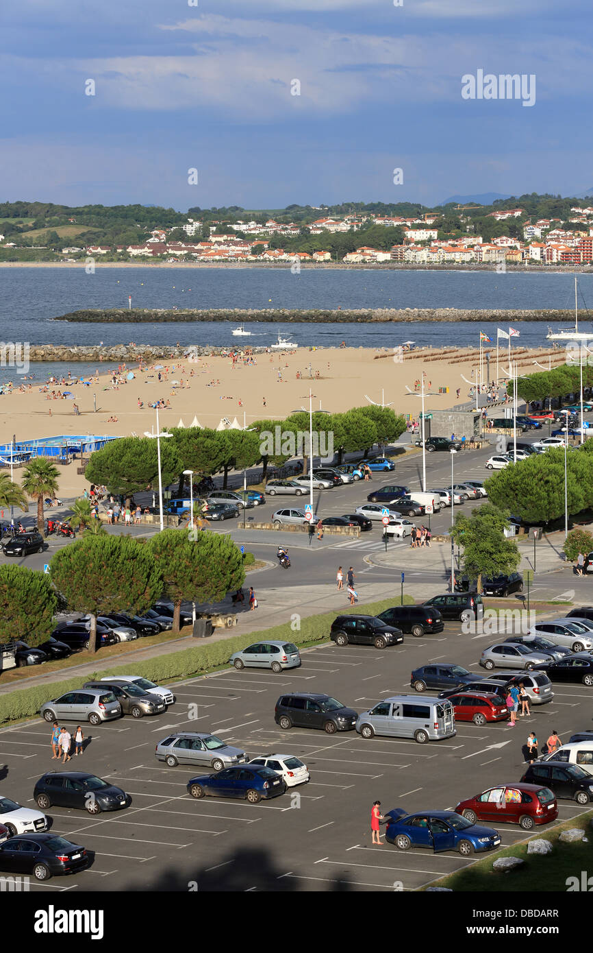 Busy carpark at Hondarribia beach in the Basque Country during summer Stock Photo
