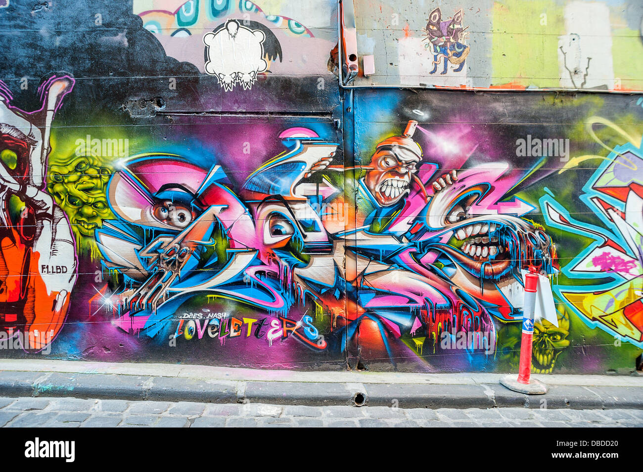 Melbourne's Hosier Lane is a celebrated landmark where legal street art decorates the walls. Stock Photo