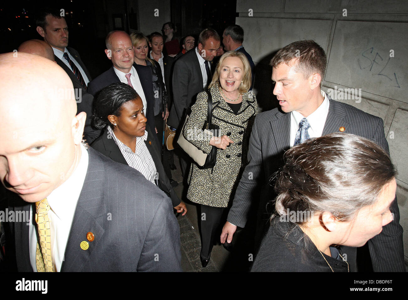 US Secretary of State Hillary Clinton leaves the Wolseley restaurant after dining with Foreign Secretary William Hague and his wife Ffion Hague London, England - 24.05.11 Stock Photo