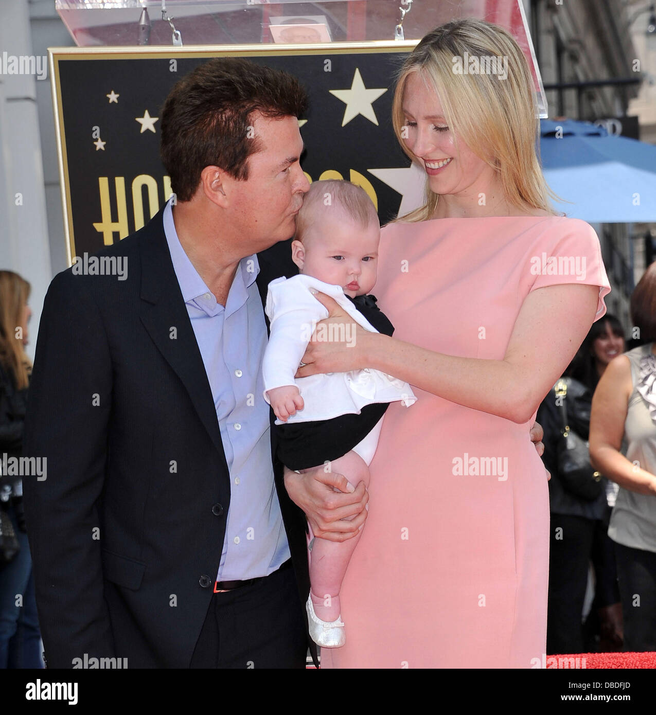 Simon Fuller and Natalie Swanston with their daughter Simon Fuller receives a star on the