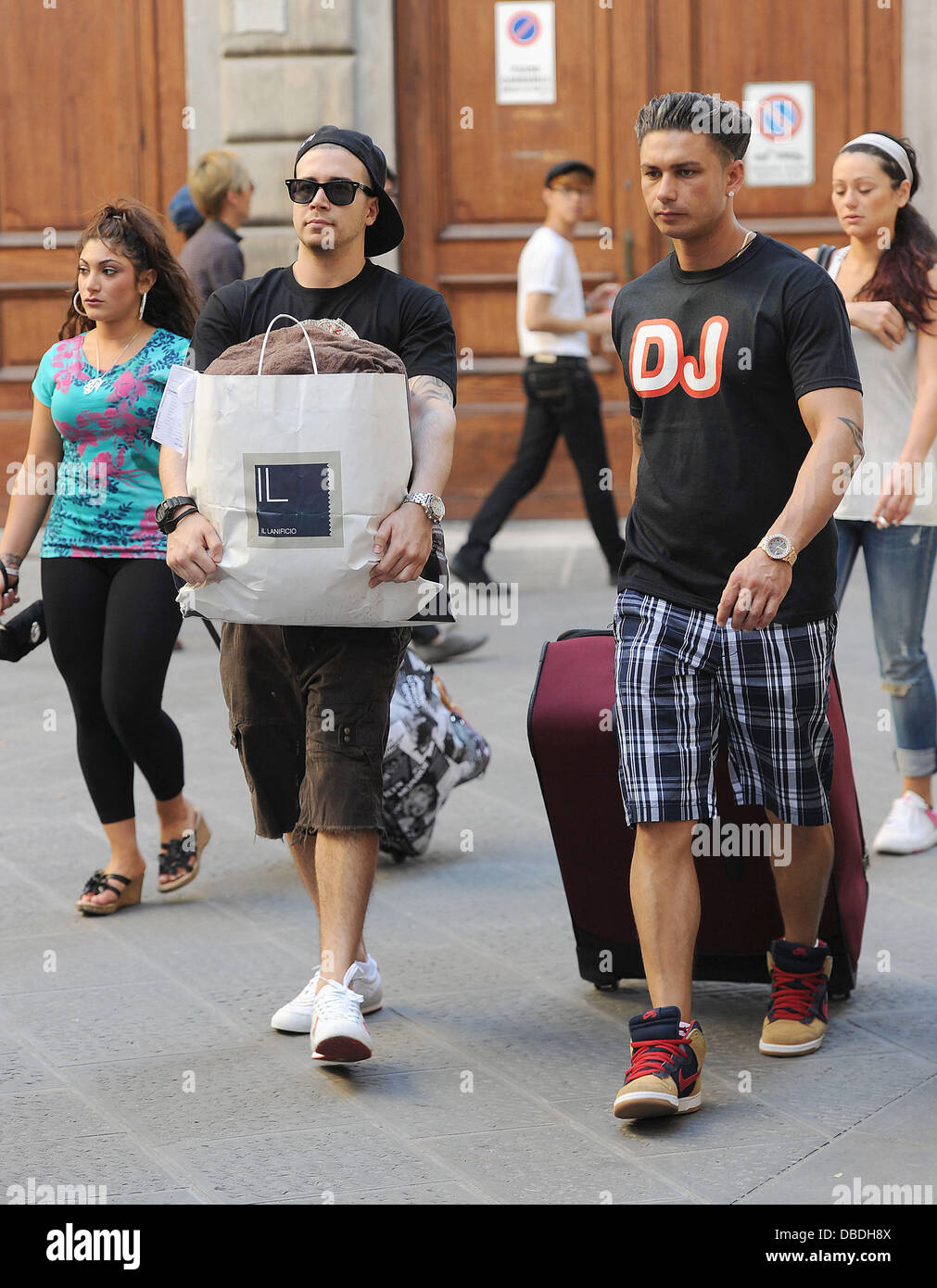Jenni 'JWoww' Farley, Deena Nicole Cortese, Paul 'Pauly D' DelVecchio and Vinny Guadagnino Take their dirty clothes to the laundry, before walking back to the Jersey Shore house. Florence, Italy - 24.05.11 Stock Photo