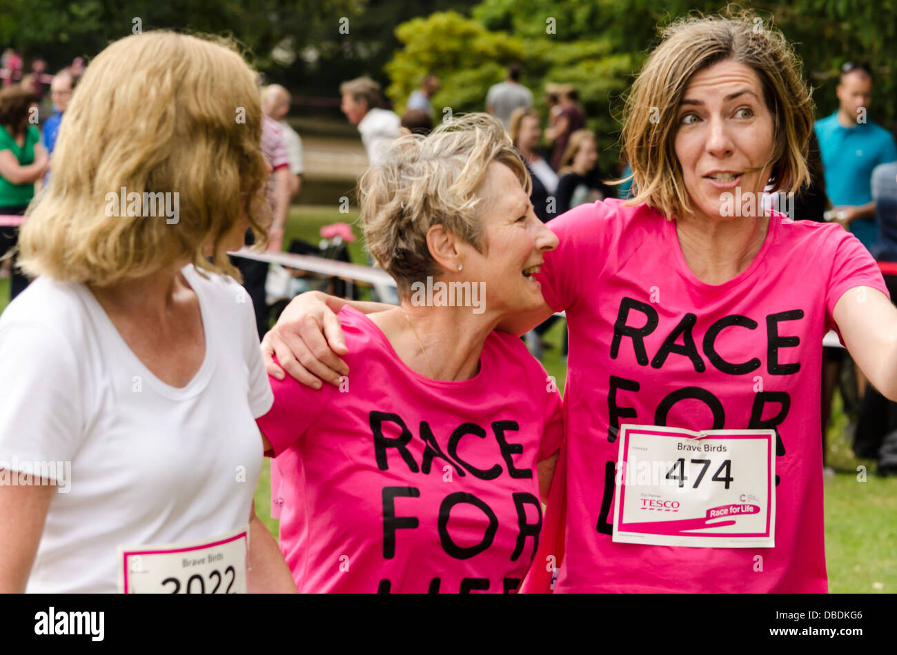Three friends taking part in Race for Life UK Stock Photo