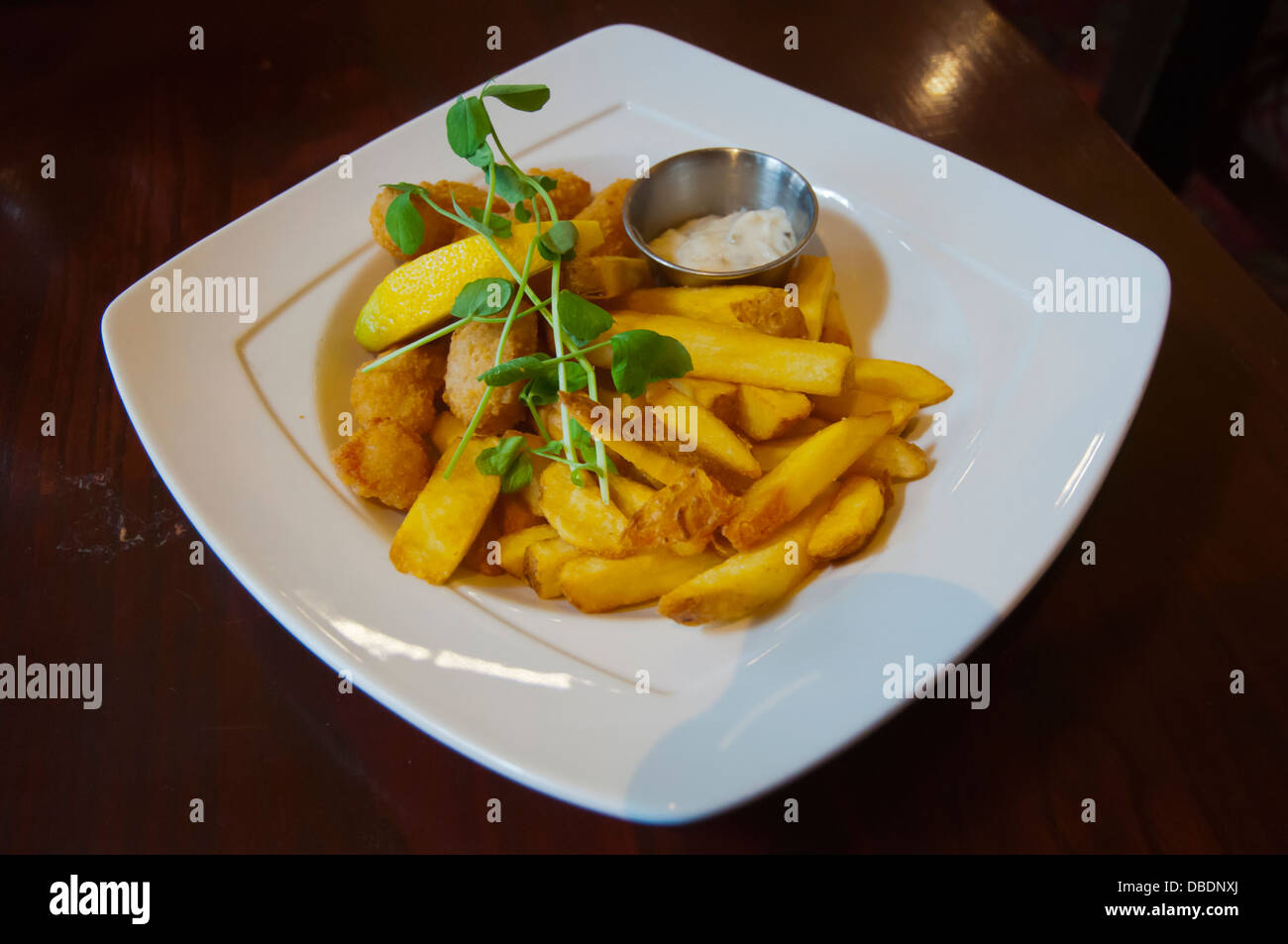 Lunch of pattered and fried seafood and chips the Kenilworth pub Rose street New Town central Edinburgh Scotland Britain UK Stock Photo