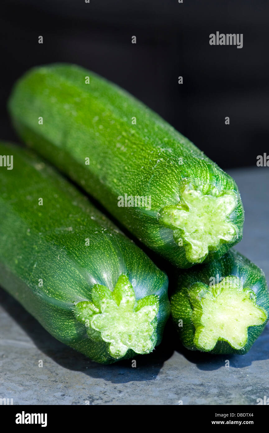 Three fresh courgettes Stock Photo
