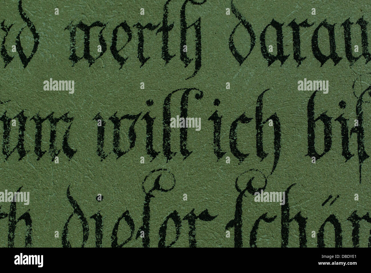 A photograph of some ancient German text on a concrete wall Stock Photo ...