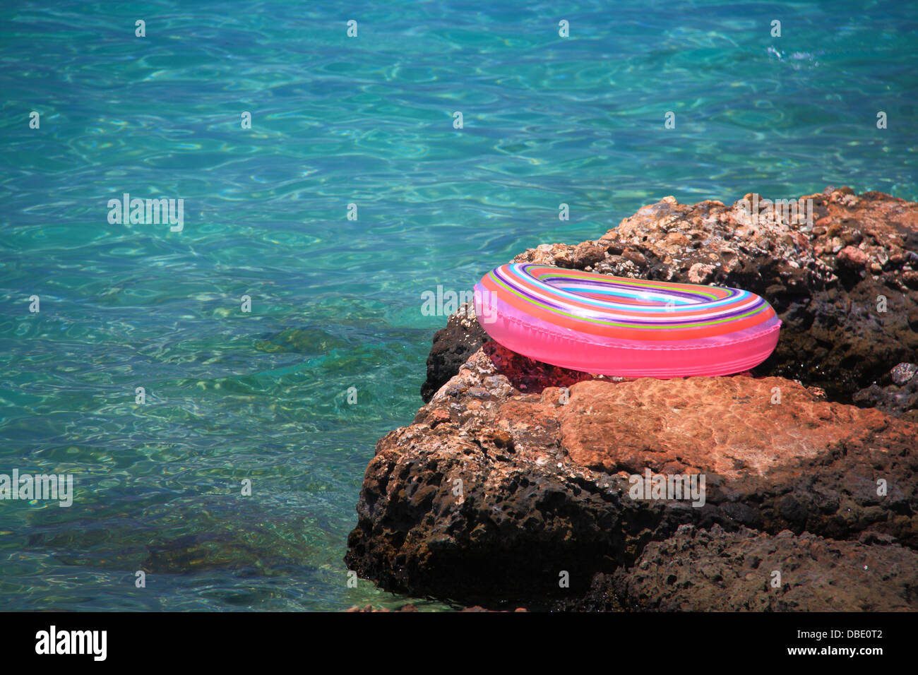 Buoy near turquose sea and consept of summer vacation Stock Photo