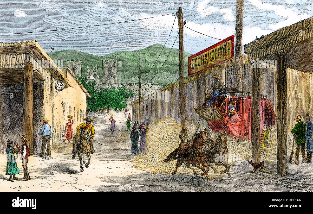 San Francisco Street, end of the Santa Fe Trail in Santa Fe NM, 1870s. Hand-colored woodcut Stock Photo