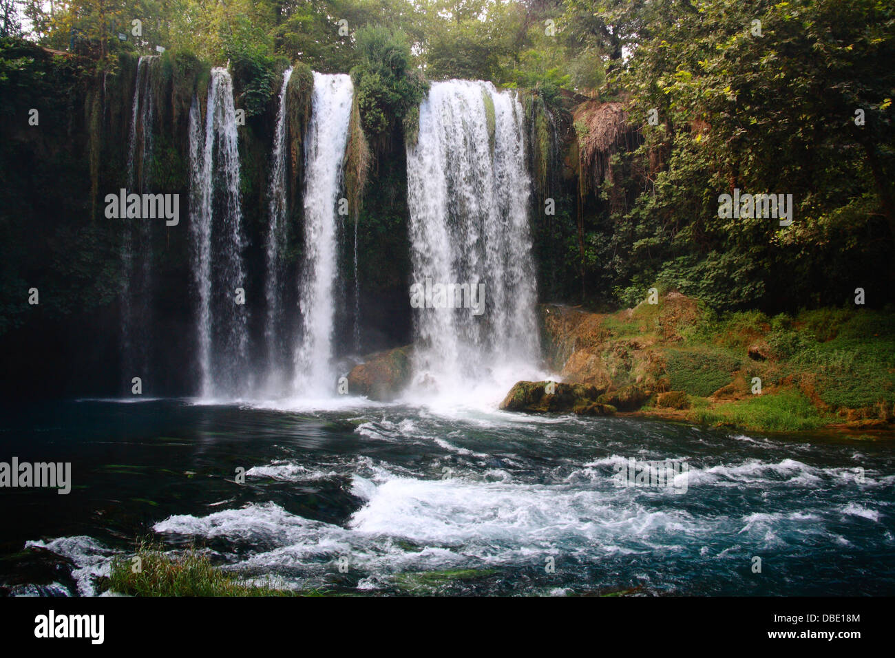 duden waterfall in antalya turkey with tree and mountain view Stock Photo