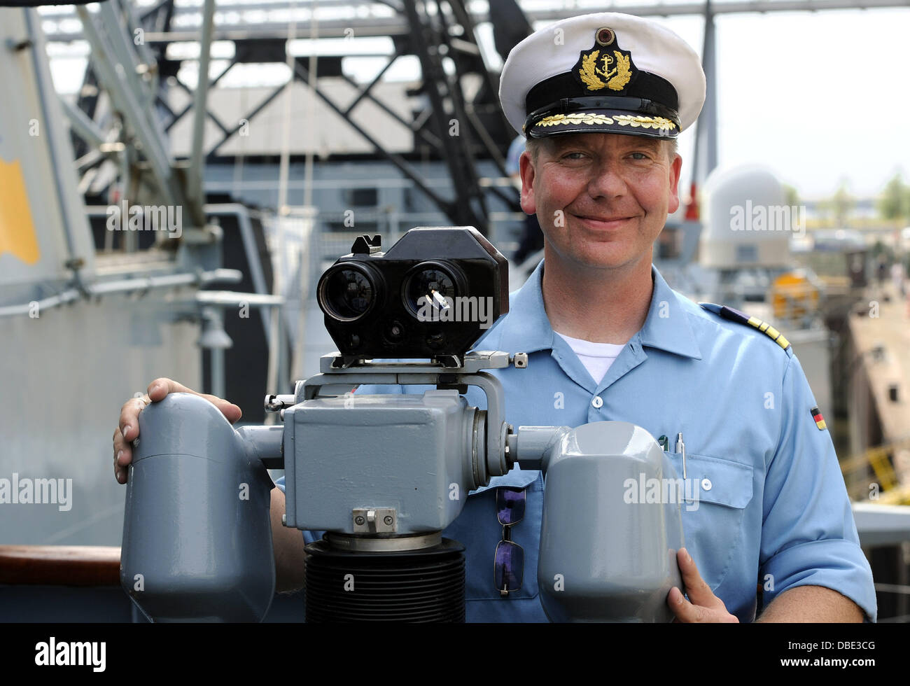 Bremen, Germany. 29th July, 2013. Commander of Frigate 'Bremen', Frigate captain Ingolf Schlobinsky, is pictured on his ship in the Grain Habour in Bremen, Germany, 29 July 2013. The ship of the German navy visited its partner city for the last time. The ship will be de-commissioned after the visit after 31 years of service. Photo: INGO WAGNER/dpa/Alamy Live News Stock Photo