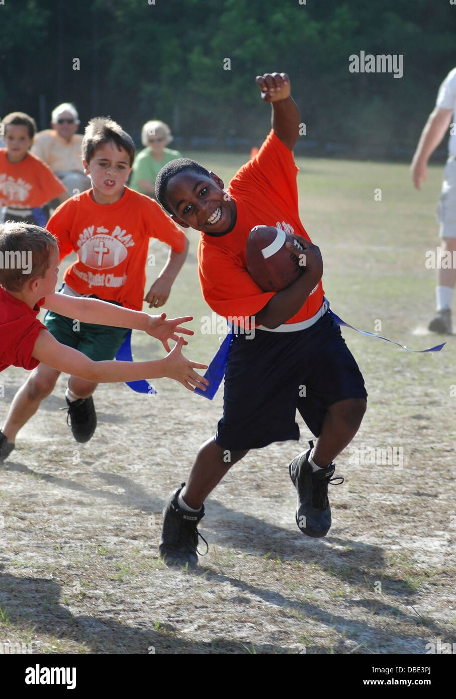 Boys playing flag football Stock Photo Alamy
