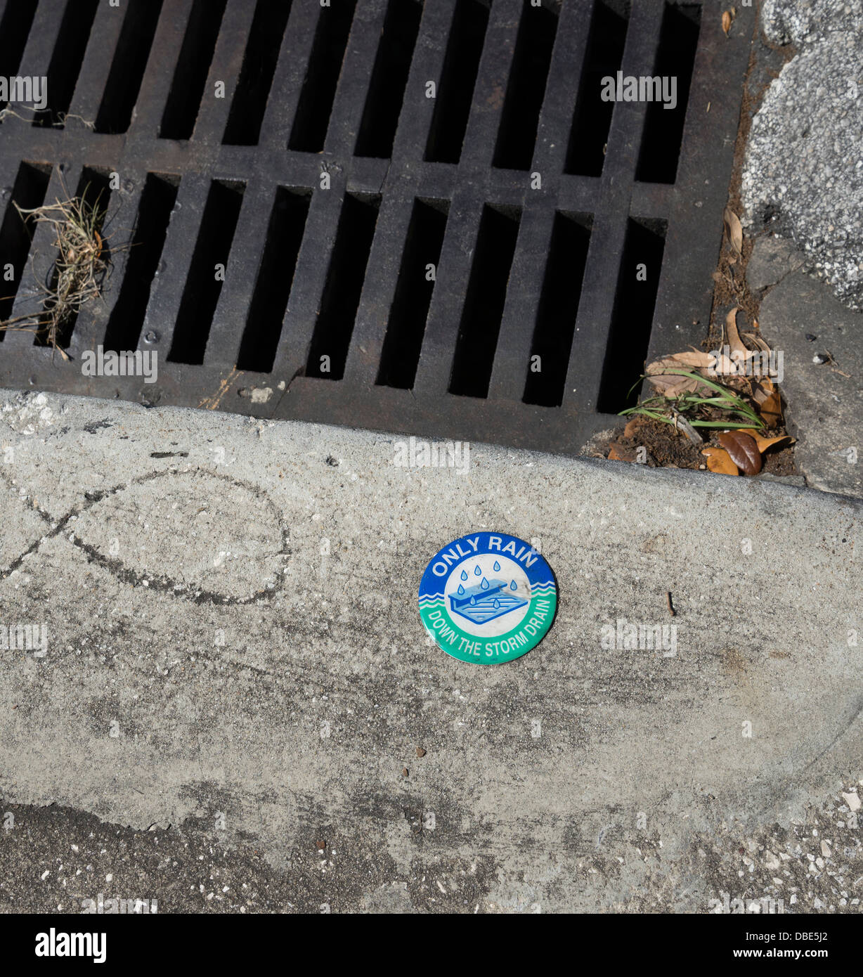 Storm drain city street. Stock Photo