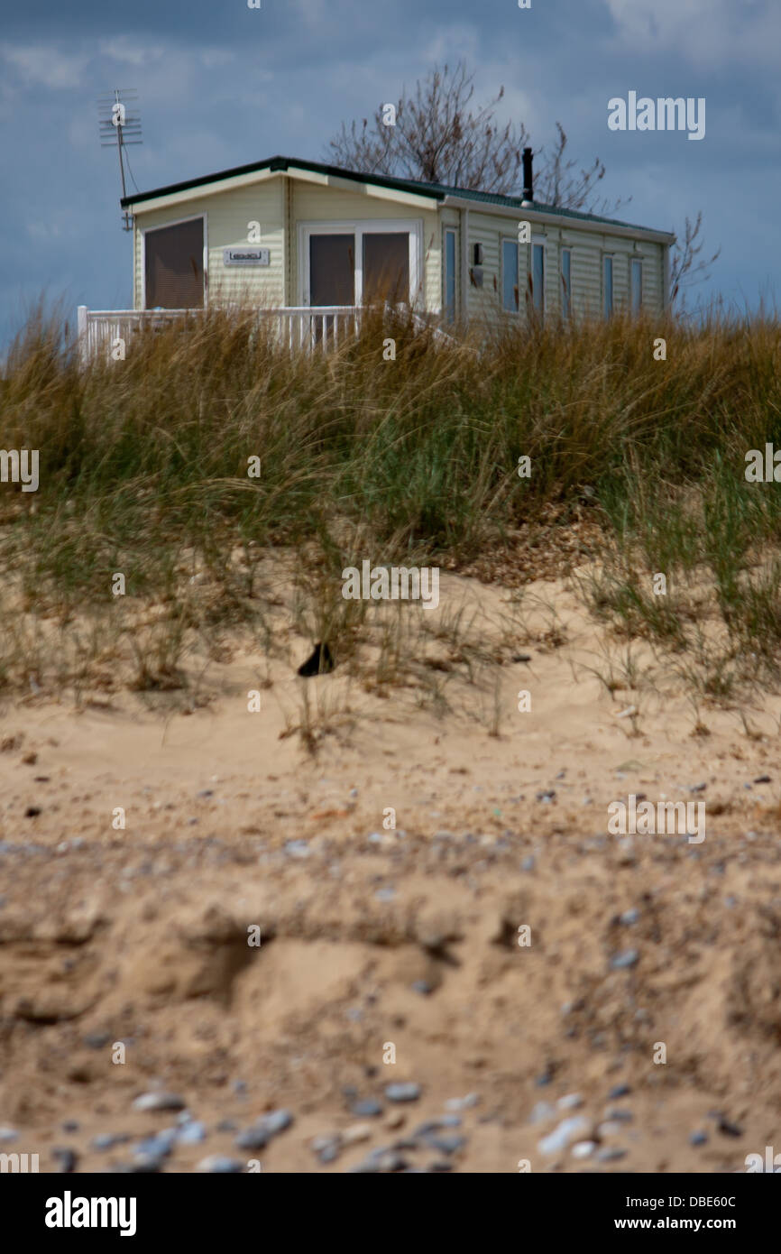 A large static caravan on the beach at Great Yarmouth seaside town. Stock Photo